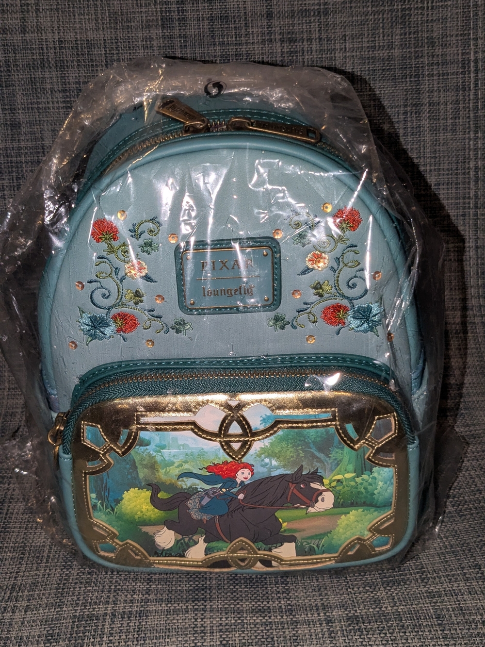 Loungefly Princess Stories Series Merida Mini Backpack Teal with Gold Accents